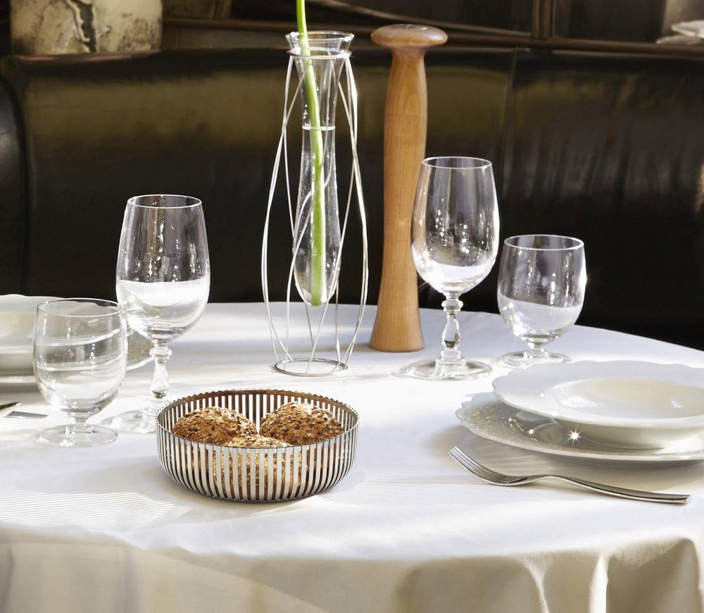 Alessi designer fruit bowl angle view showing slatted stainless steel design