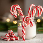 Two twelve count boxes of classic peppermint hard candies arranged for holiday decoration.