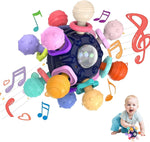Tohibee sensory toy showing colorful textured silicone grips and rattle dome
