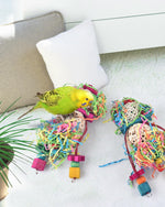 Close up of safe edible dyed components on bird toy