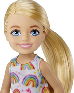 Barbie Chelsea doll wearing rainbow print dress full length