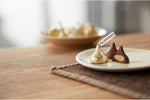 Hershey's Kisses Milk Chocolate with Almonds bag showing USA product authenticity details