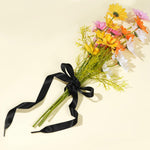 Marrywindix satin shoestrings tied in a bow