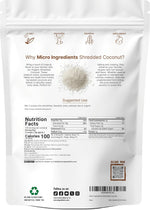 Close up of raw medium sized unsweetened coconut flakes texture
