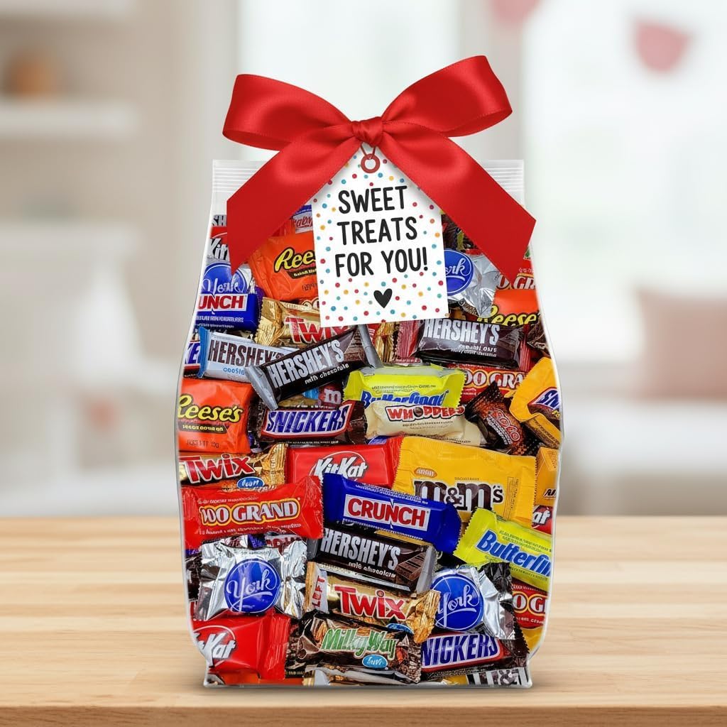 Yummy Chew assorted chocolate variety bag sitting on an office reception desk next to a filled glass snack bowl