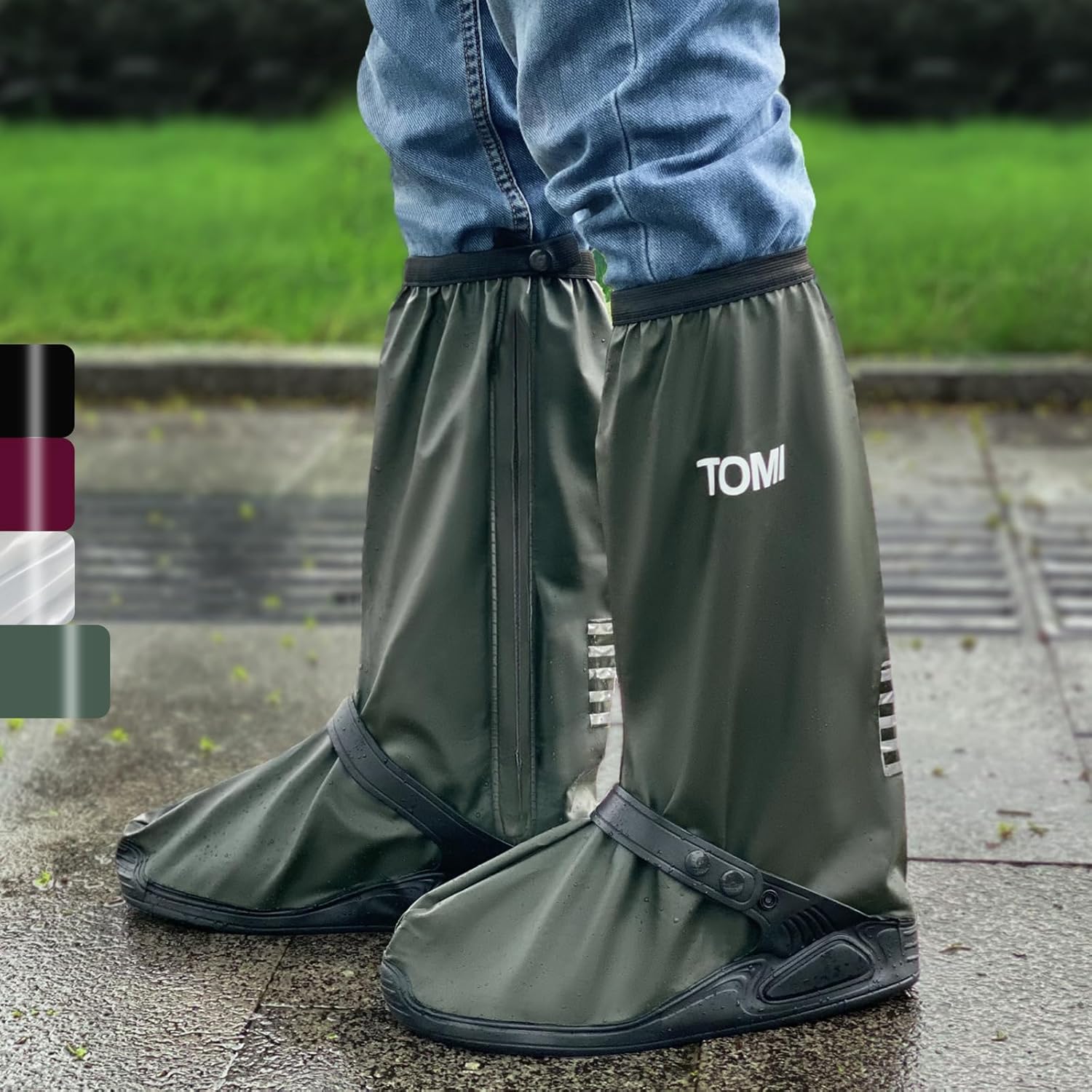 TOMI Waterproof Shoe Covers front view showing the dark green premium PVC material and waterproof zipper closure.