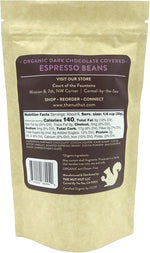 Close up of organic espresso beans coated in dark chocolate