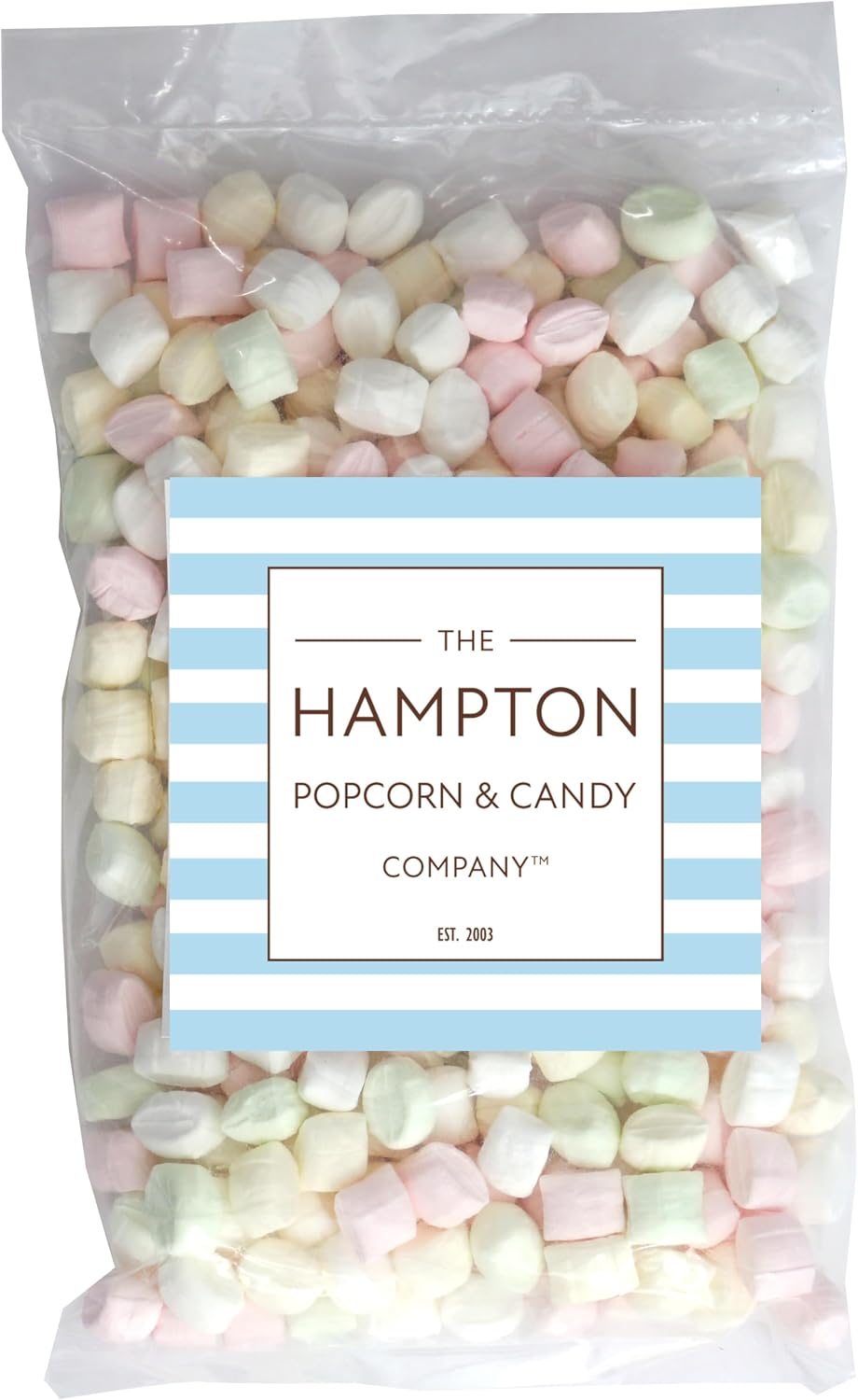 A bowl filled with pink, yellow, and blue soft after-dinner pillow mints for event decoration.