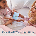 Rvelidode blue wallet showing floral letter detail