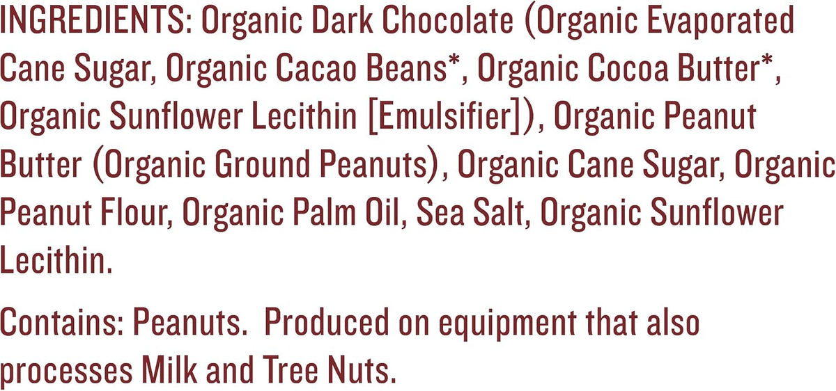 Individually wrapped organic dark chocolate peanut butter cups scattered on a table