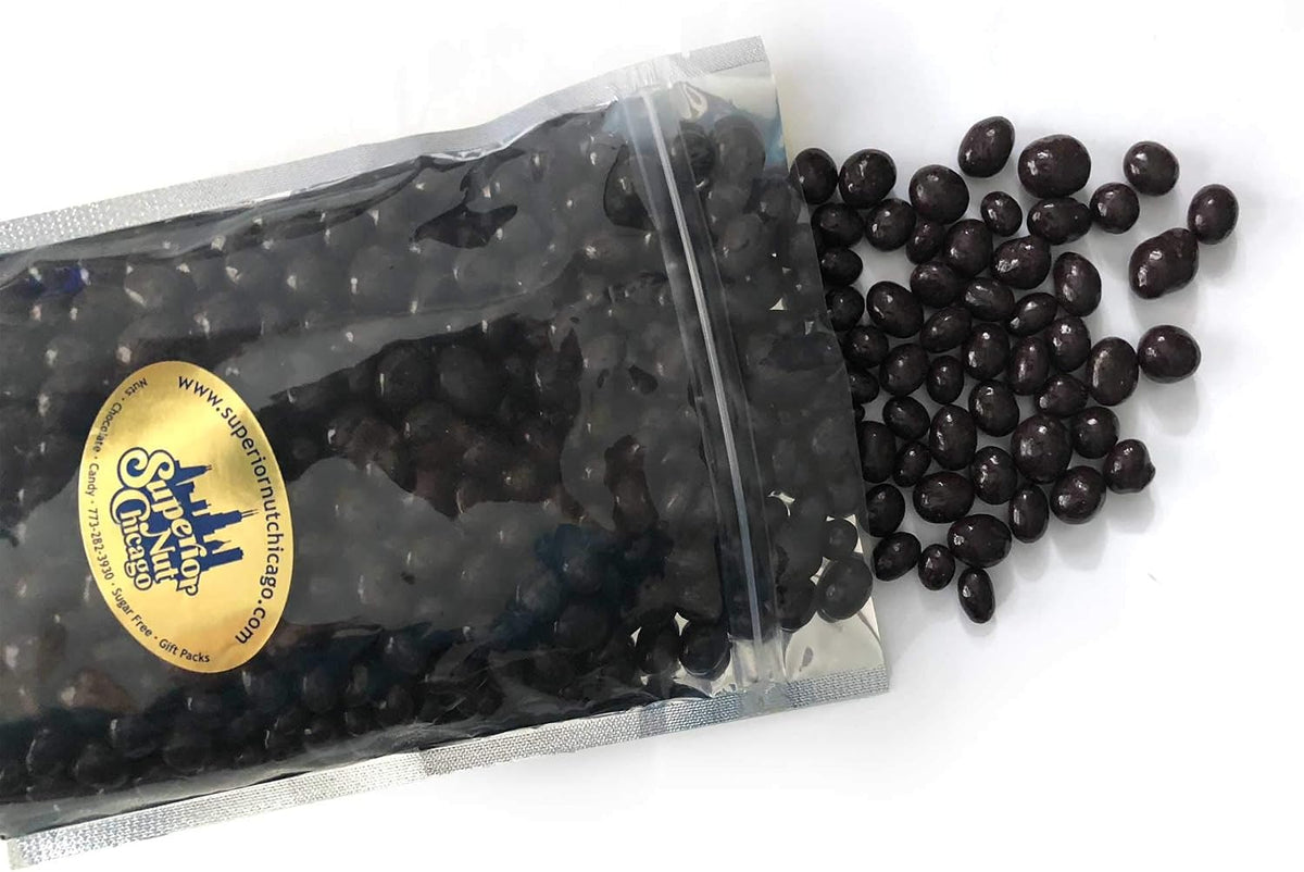 Close up shot of dark chocolate coated coffee beans texture