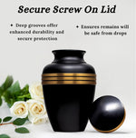 Large decorative human ash urn showing matte black finish detail