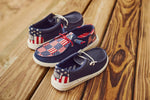 HEYDUDE kids navy canvas casual loafer side profile