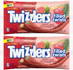 Chewy tropical flavor pink guava and paradise punch filled candy twists close-up