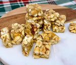 Bite sized old fashioned peanut butter candy pieces spread out from the two pound package.