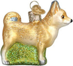 Side profile of Old World Christmas Chihuahua glass blown ornament with glitter details.