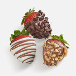Close up of hand dipped strawberries with chocolate drizzle