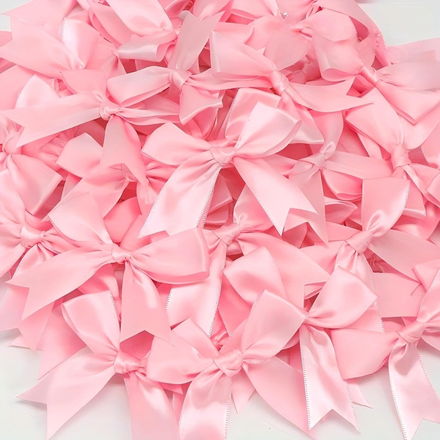 TheWhimsicalFlower pink gift wrap bows 50 pieces package front view showing glossy pre-tied satin ribbons for premium wrapping options.
