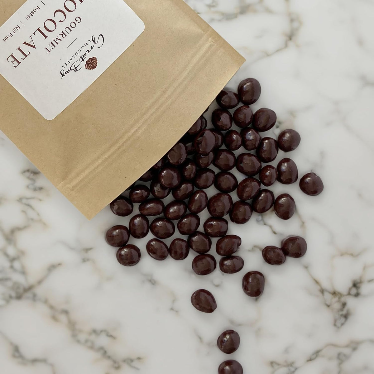 Close up of gourmet dark chocolate covered espresso beans