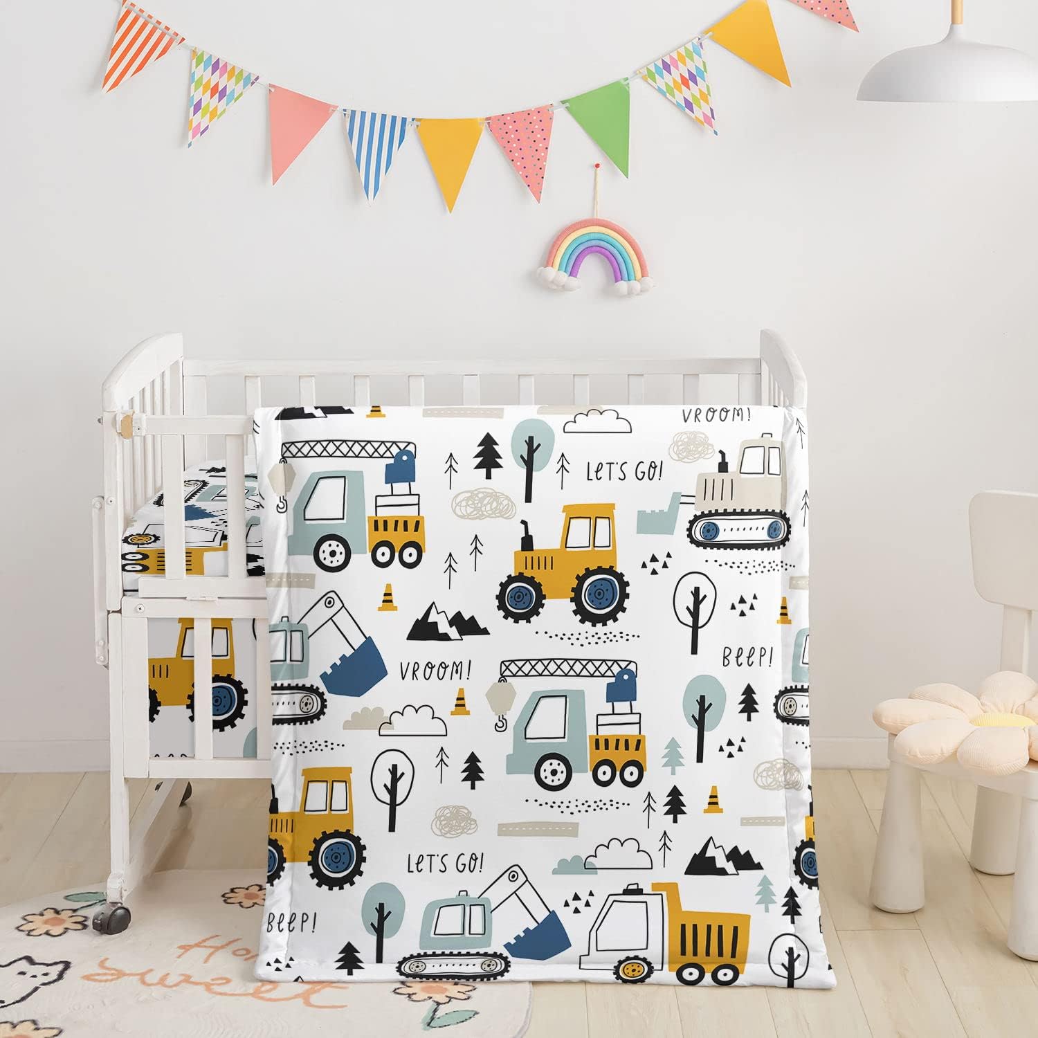 Datura Home Three Piece Nursery Crib Bedding Set front view featuring quilted comforter and fitted sheet.