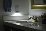 SnapPower LED night light installed on duplex electrical outlet