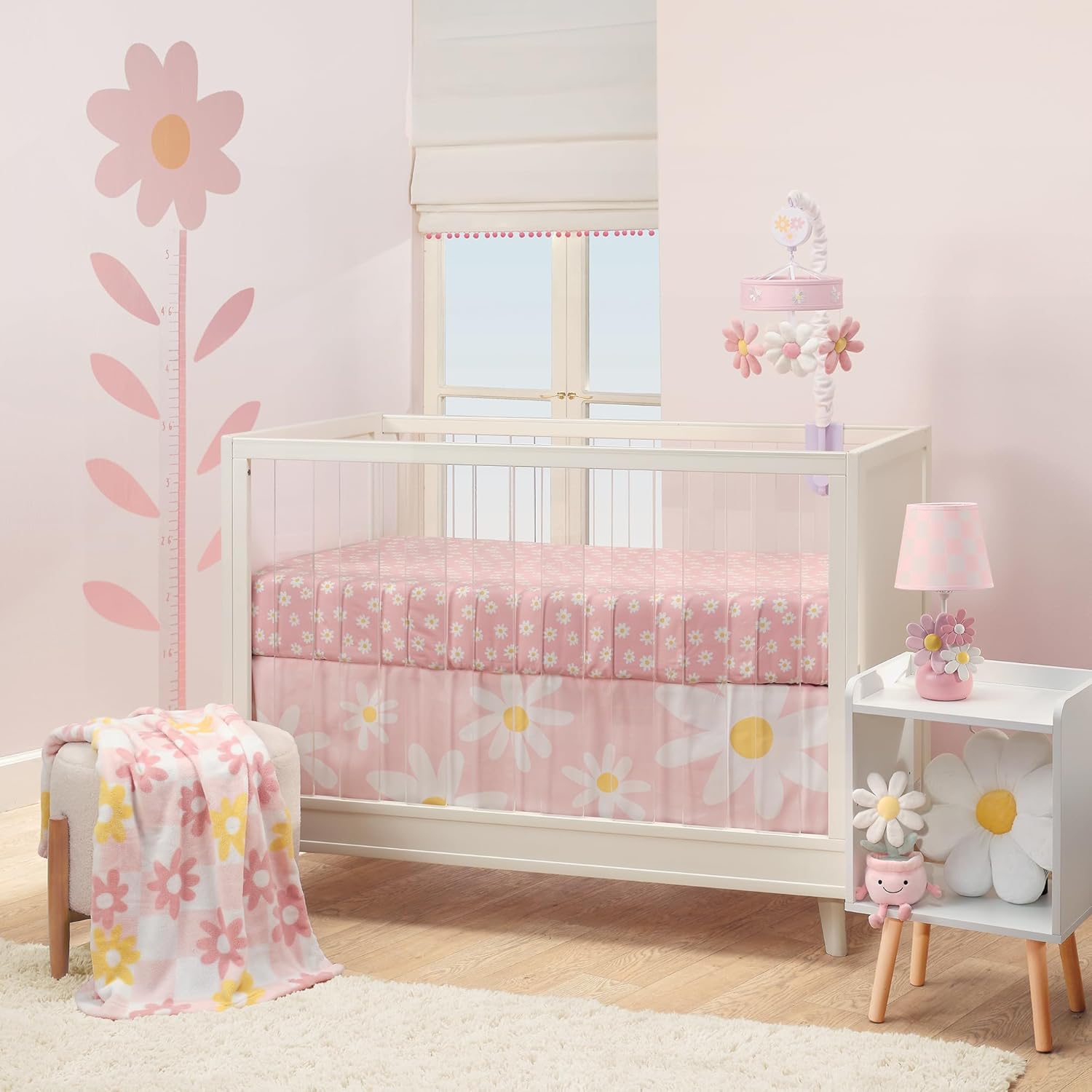 Lambs and Ivy Daisy Dreams 3 piece crib bedding set front view fully assembled on a nursery crib mattress.