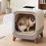 Replacing an odor control carbon pad in the top lid of a covered cat litter box