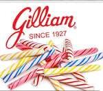 Classic red and white striped cinnamon soft sugar sticks close up.