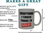 White ceramic novelty mug for realtors on a clean surface