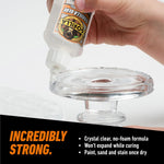 Gorilla adhesive bottle nozzle and cap closeup