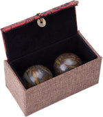 Pair of polished cyan nuwa stone exercise massage spheres in gift box