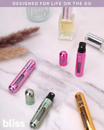 Bliss TSA approved travel toiletries bottles showing fine mist spray.