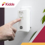 Kidde carbon monoxide detector test and hush button close up