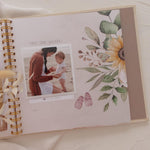 Peachly baby book open flat displaying thick card stock