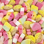 The five individually packaged candy varieties next to the clear resealable stand up mixing bag.