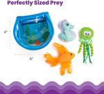 Cat pawing inside clear fish bowl container