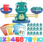 Kaodezhu dinosaur math balance toy front view showing the green scale balancing numbers and figures.