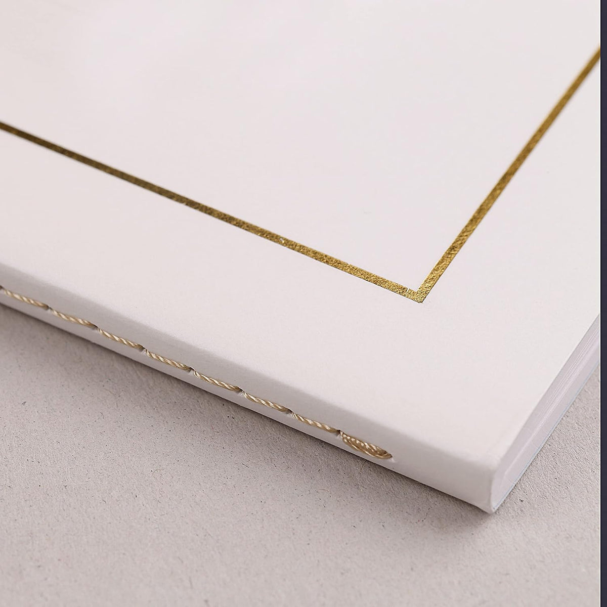 Clairefontaine Triomphe notebook showing thread-stitched spine and binding