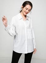 Minibee long sleeve blouse raw edge cuff close up