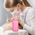 FOMIYES pink plastic cleaning bottle close up