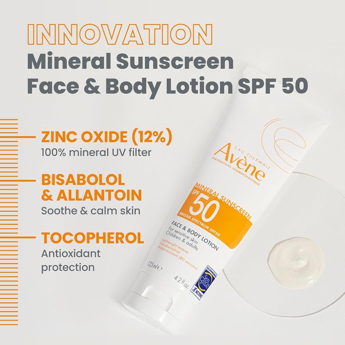 Avène sunscreen bottle held in hand for scale.