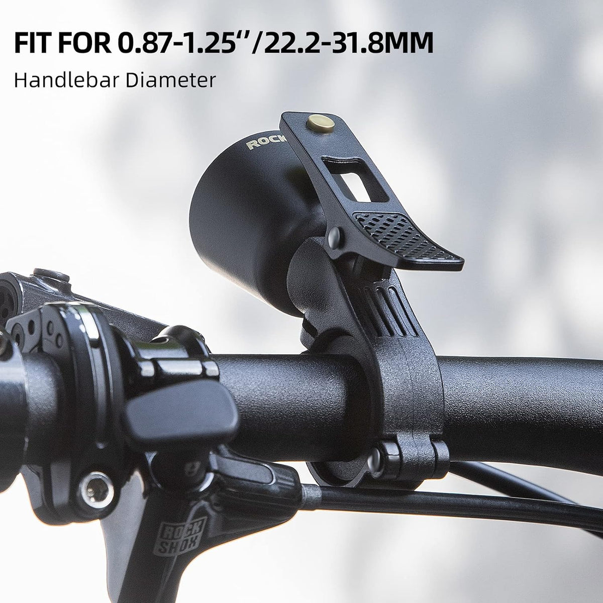 Side angle view of the bicycle warning horn attached to a handlebar.