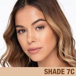 Authentic USA imported Tilbury makeup product bottle on a clean background.