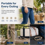 Portable pet waste management tool being folded for storage during outdoor travel.