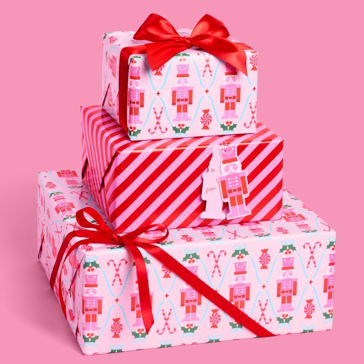 xo, Fetti Pink Nutcracker Wrapping Paper and Tag Set front view showing premium holiday sheets