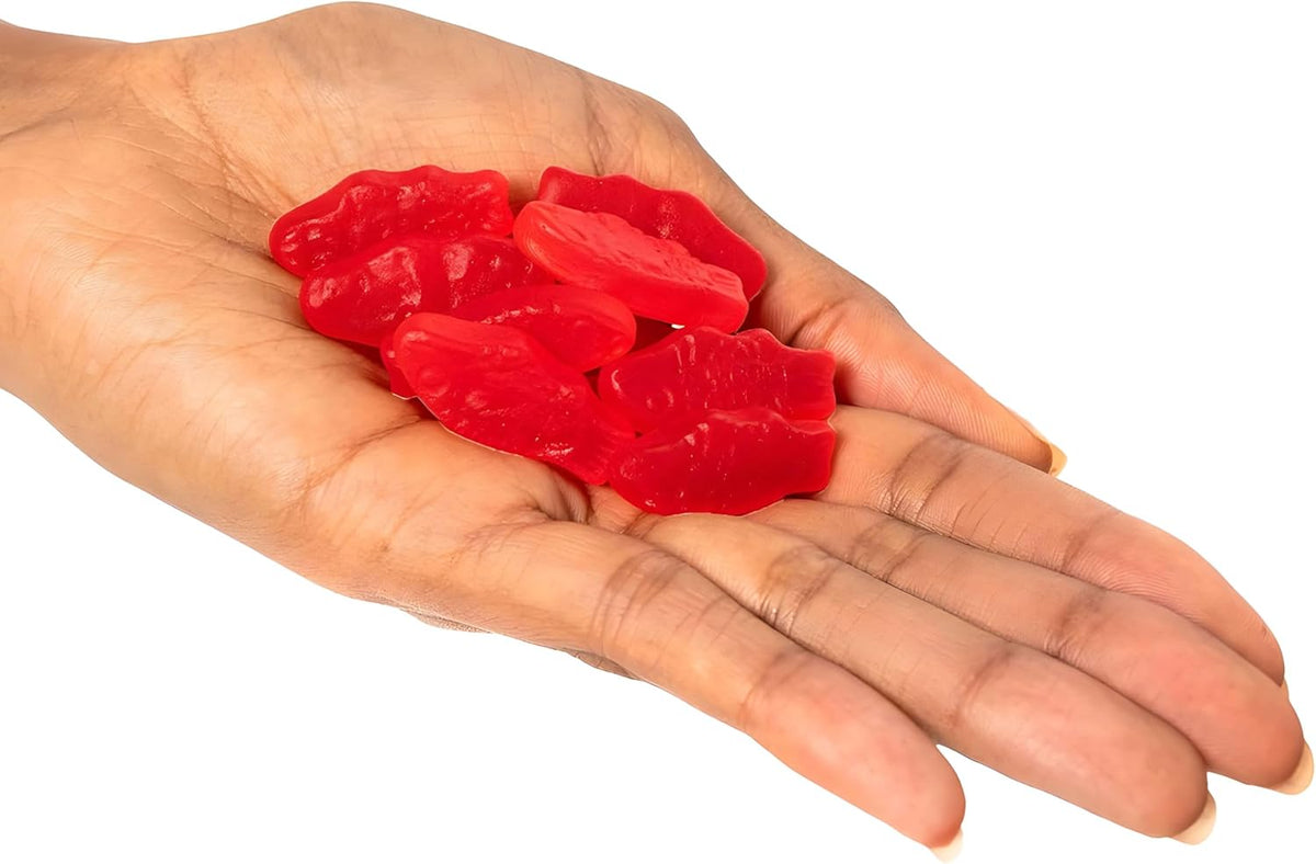 Close up view of the soft and chewy red mini fish candy pieces.