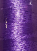 Close up of Majestic Purple polyester embroidery thread spool texture
