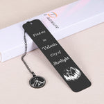 Inspirational reading accessory bookmark displayed on a wooden surface