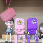 Accessory bundle laid out including case, sleeve, and strap