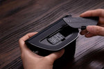 8BitDo Ultimate Bluetooth Controller connected to charging station